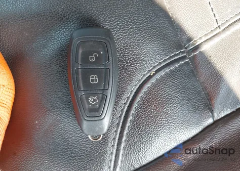 2015 Ford Fiesta Titanium z USA, uszkodzony, nr VIN 3FADP4FJ9FM213111